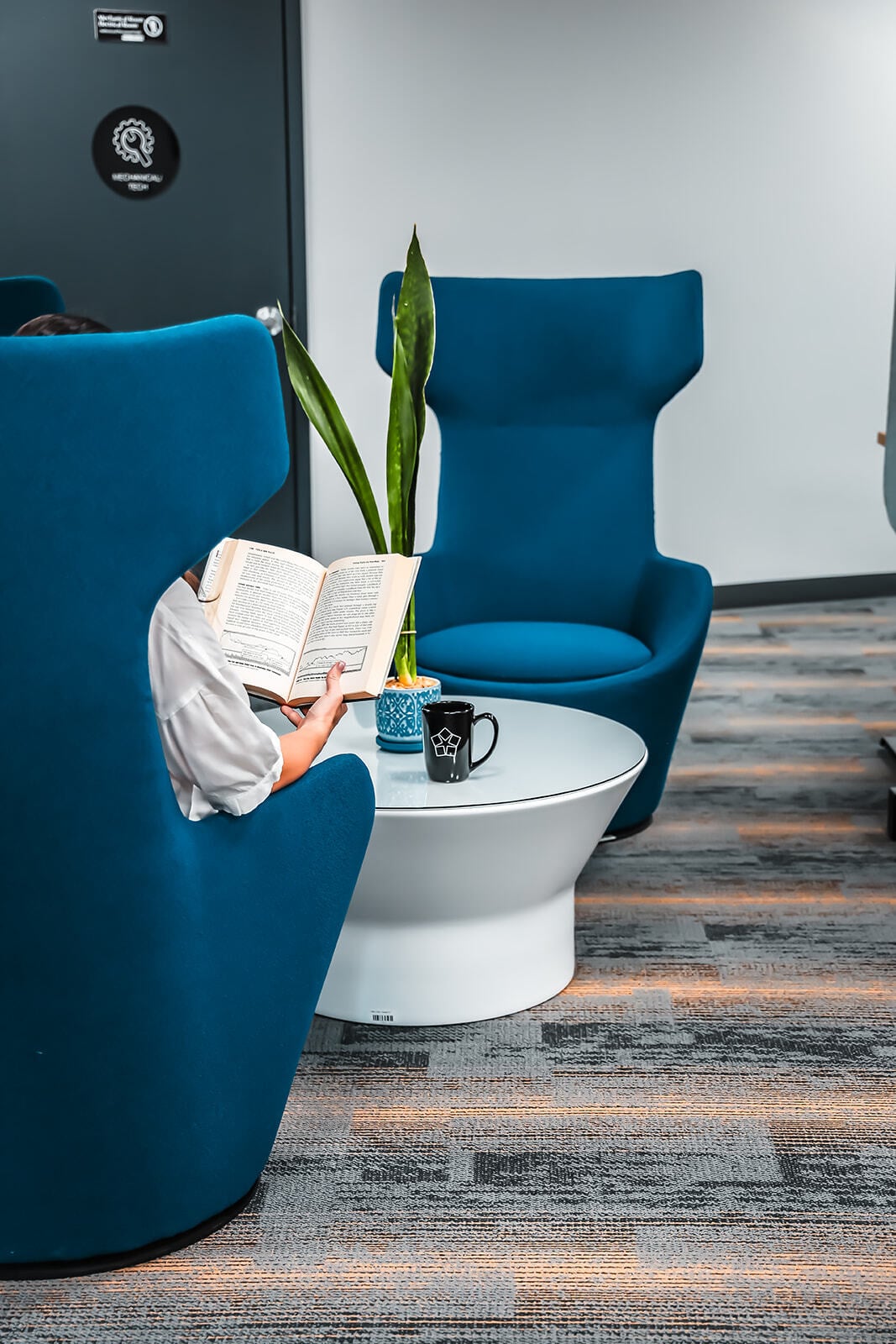 Signal House Cayman Enterprise City Reading Blue Chairs